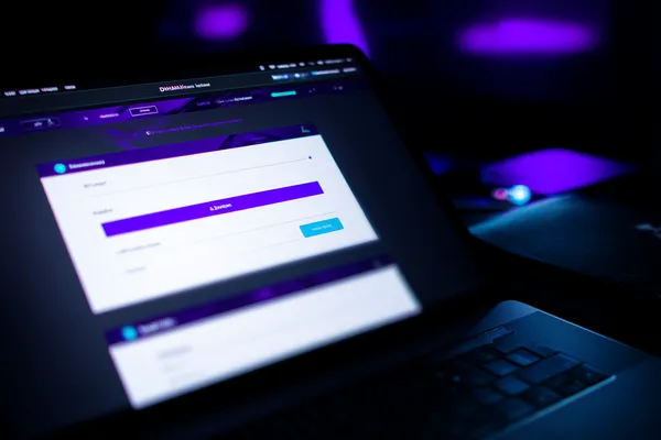 A confident dealer surrounded by casino chips inviting players to access their BANGBED account, reflecting quick and easy login options.